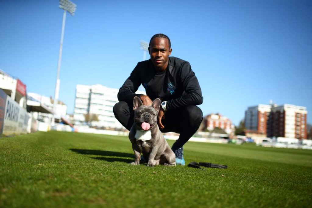 Jofra Archer with Chris Jordan's dog Griffin