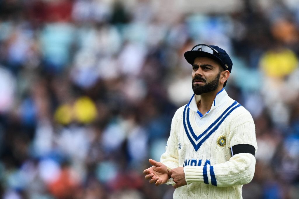 Virat Kohli wearing the black armband while fielding at the WTC final