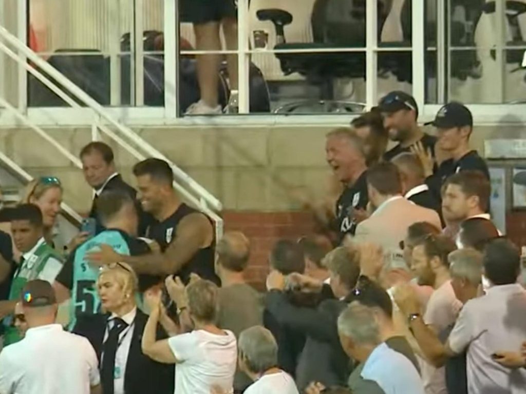 Alec Stewart greets Sam Curran after the Surrey all-rounder hit 102* against Hampshire