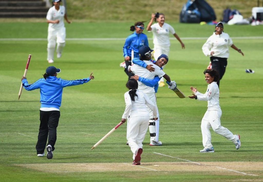 India Women celebrate the win in the one-off Test