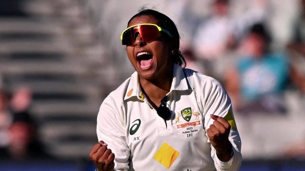 Alana King celebrates after taking a wicket at the MCG