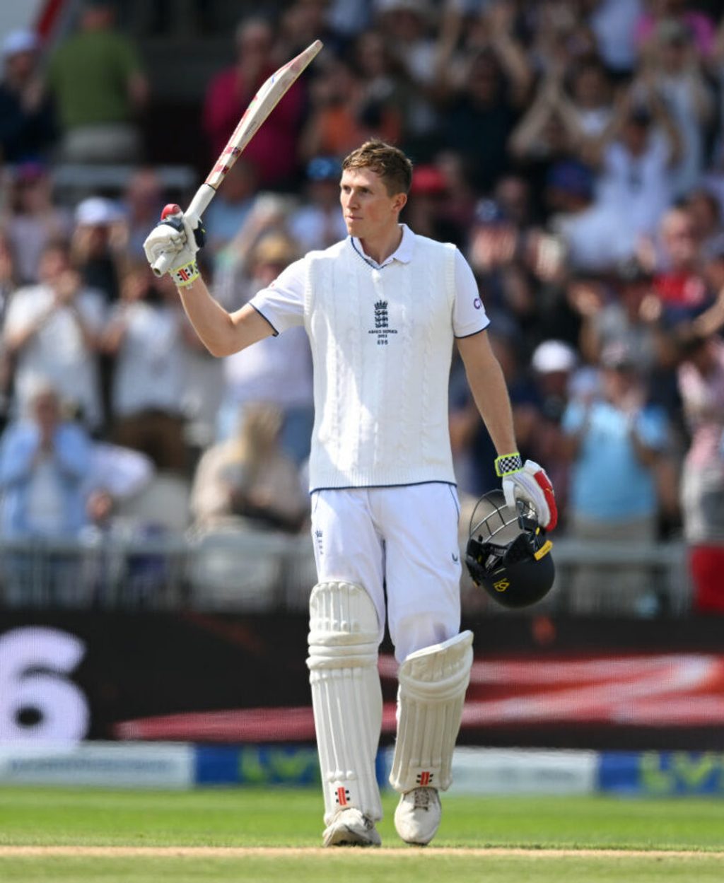 Zak Crawley celebrates reaching his hundred