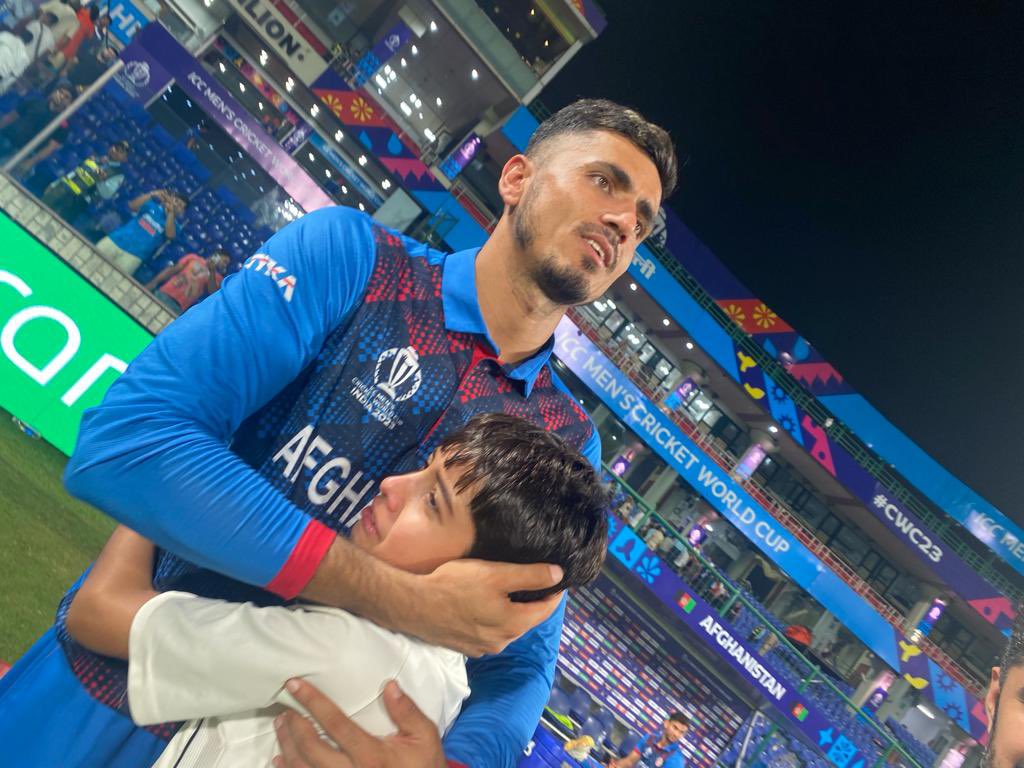 Mujeeb Ur Rahman hugging crying Afghan fan